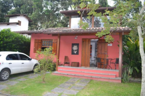 Casa 29 no condomínio Pereque-Açu com playground e piscina